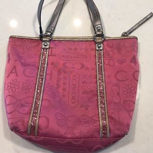 Donating 1/11 Coach purse